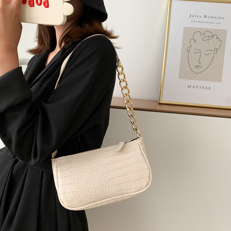 Fashionable one-shoulder baguette clutch bag