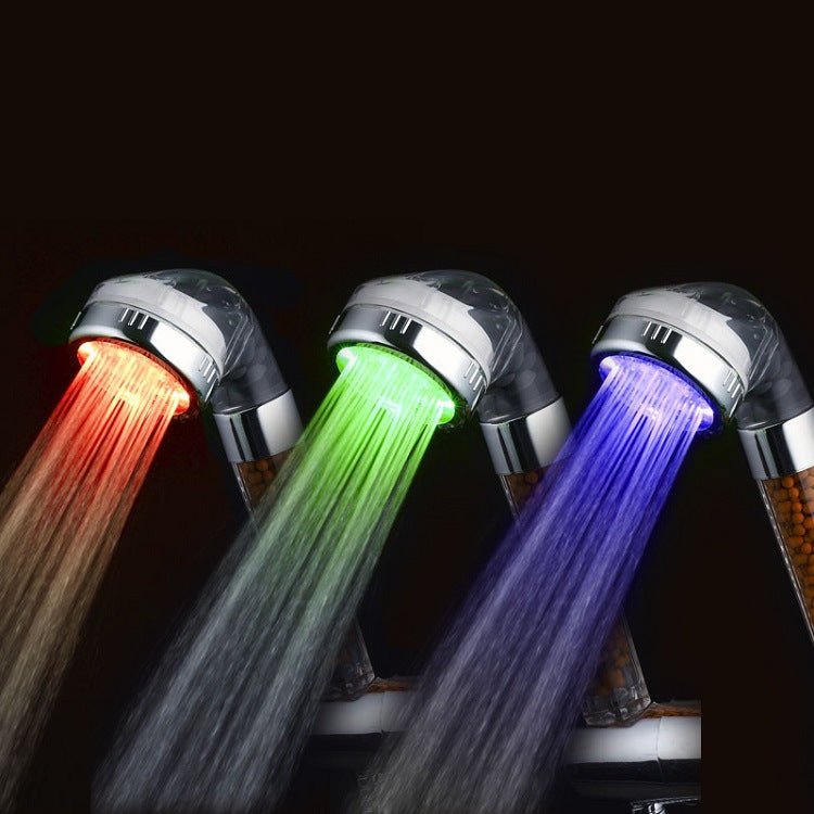 Negative ion shower nozzle with pressurized water stop LED light
