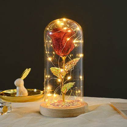 Rosenblüten, LED-Licht in Glasabdeckung